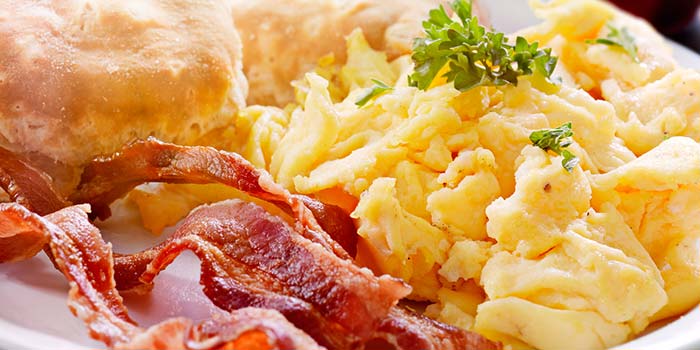 Eggs, bacon and biscuits are some of the delicious sides you will find at Rapids Riverside Bar & Grill in South Range WI.